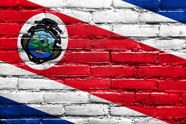 Costa Rica Bandeira pintada na parede de tijolo — Fotografia de Stock