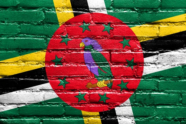 Dominica Flag painted on brick wall — Stock Photo, Image