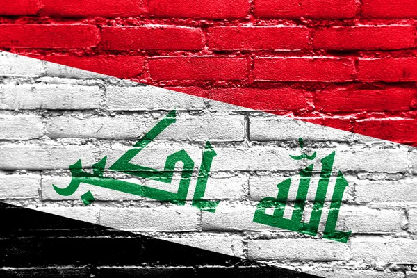 Tuğla duvara boyalı Irak bayrağı — Stok fotoğraf