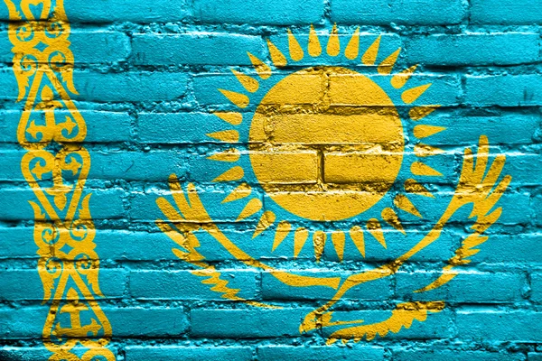Kazakhstan Flag painted on brick wall — Stock Photo, Image