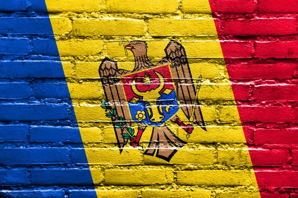 Moldavia Bandera pintada en la pared de ladrillo — Foto de Stock