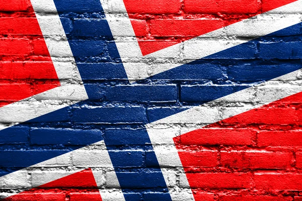 Флаг Норвегии, раскрашенный на кирпичной стене — стоковое фото
