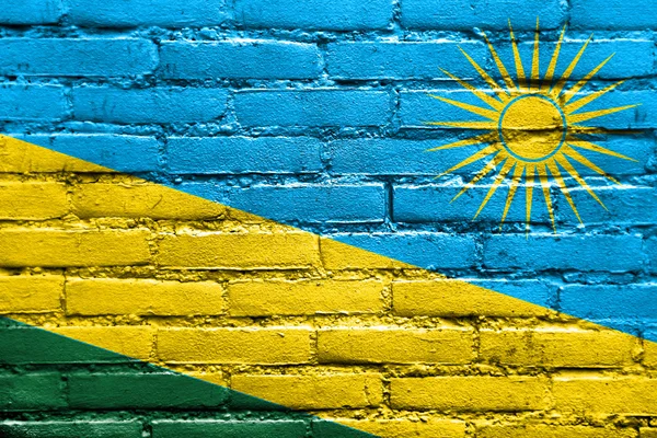 卢旺达国旗画在砖墙上 — 图库照片