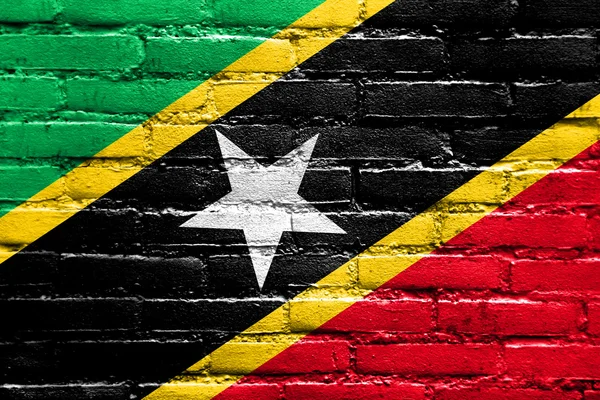 Saint Kitts and Nevis Flag painted on brick wall — Stock Photo, Image