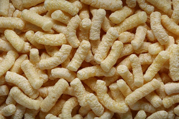 Yellow corn sticks close-up top view. Background and textures. — Stock Photo, Image