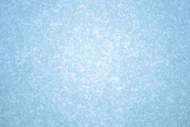 Çerçevenin ortasında parlayan doğal bir parıltıyla soluk tonda gri bir tonu olan mavi buz. Doğal arkaplan.