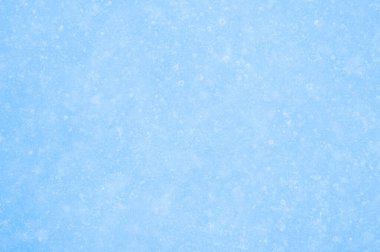 Açık dondaki açık mavi buz yüzeyi ve çözülmüş düzensizlikler. Arkaplan