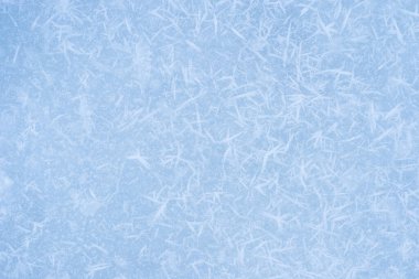 Düz bir yüzeyde desenli beyaz don olan buz mavisi. Arkaplan