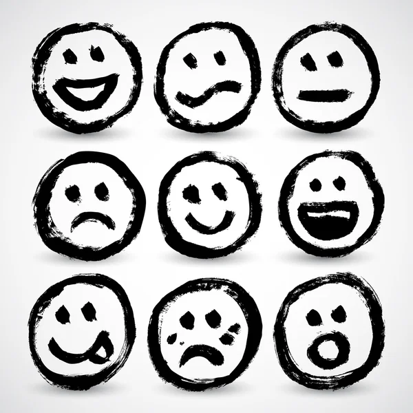 An icon set of grunge cartoon smiley faces — Stock Vector
