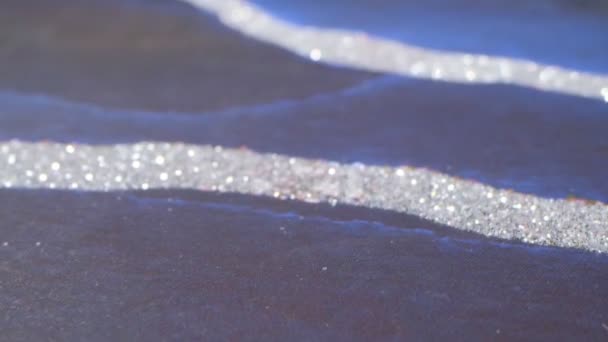 Abstract textured blue and silver glitter background. extreme close-up detailed — стоковое видео