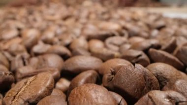food background. extreme close-up detailed roasted coffee beans
