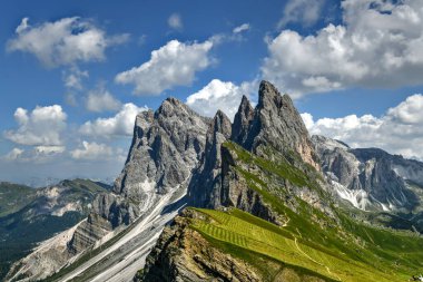 Morning view of the Gardena valley in Dolomite mountains. Location Puez-Geisler National Park, Seceda peak, Italy, Europe. Odle group is the landmark of Val di Funes.