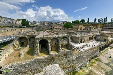 Ruins of an ancient city destroyed by the eruption of the volcano Vesuvius in 79 AD near Naples, Archaeological Park of Ercolano. clipart