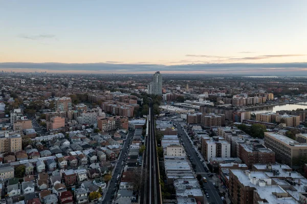Aerial view along the train tracks of Coney Island in Brooklyn, New York at sunrise.