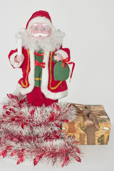 Juguete Santa Claus con regalo de Navidad — Foto de Stock