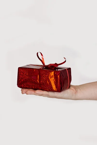 Holiday gifts in the female hands — Stock Photo, Image