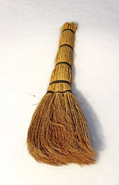 Besom on snow — Stock Photo, Image