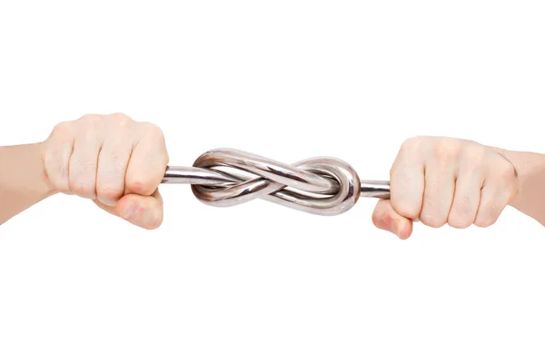 Strong knot of a metal rod in male hands — Stock Photo, Image