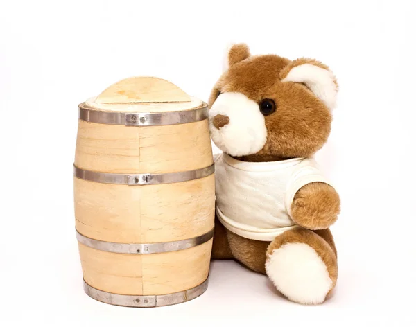 Teddy bear with the keg of honey — Stock Photo, Image