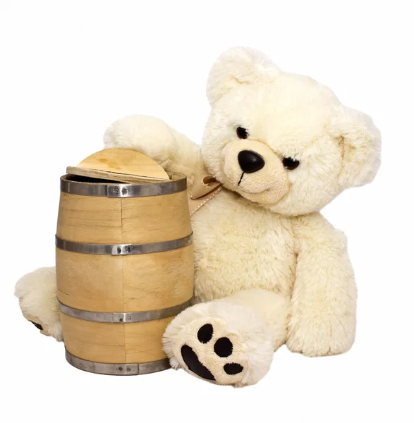 Teddy bear with the keg of honey — Stock Photo, Image