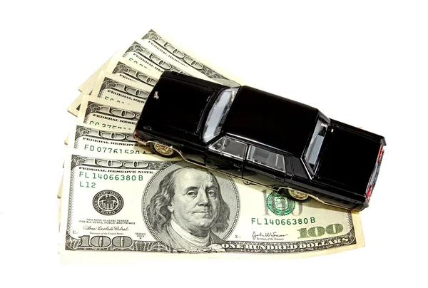 Car on stack of dollars — Stock Photo, Image