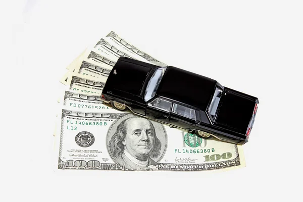 Car on stack of dollars — Stock Photo, Image