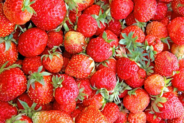 Helle saftige Erdbeeren Hintergrund — Stockfoto
