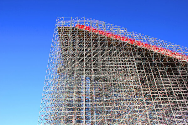 High-rise construction of scaffolding