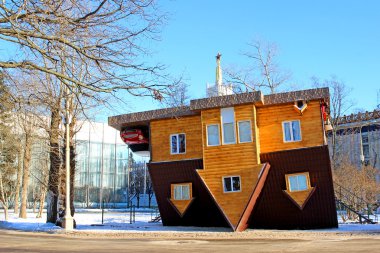Upside down house in the Russian Exhibition Center in Moscow clipart