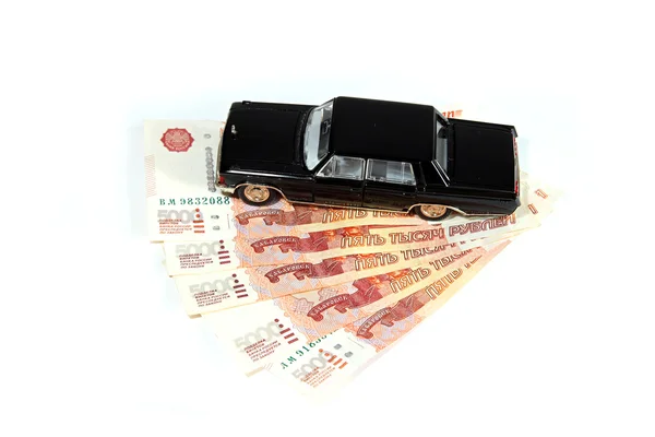 Black car on a pack of Russian rubles — Stock Photo, Image