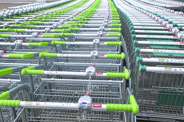 Rows of a plurality of shopping trolleys — Stock Photo, Image