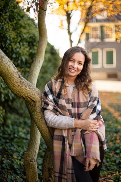 Smiling Young Woman Brown Curly Hair Warm Scarf Autumn Park — Stockfoto