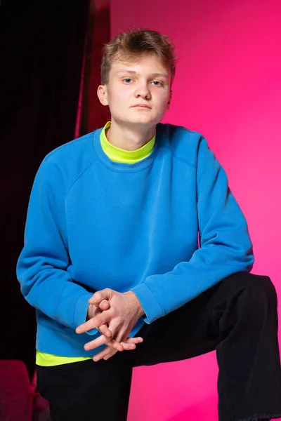 Young European Boy White Skin Blue Pink Black Background — Stock Fotó