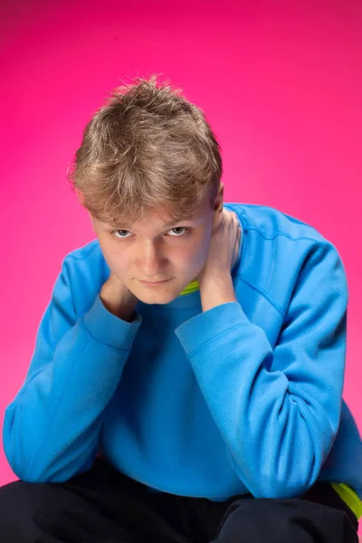 Young European Boy White Skin Isolated Pink Blue Hoody Hands — стоковое фото