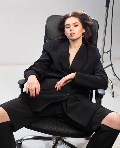 Smoking Dark Hair Young European Girl White Skin Office Chair — стоковое фото