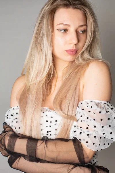 Young Woman Blond Hair White Skin Isolated Dark Grey Holding — стоковое фото