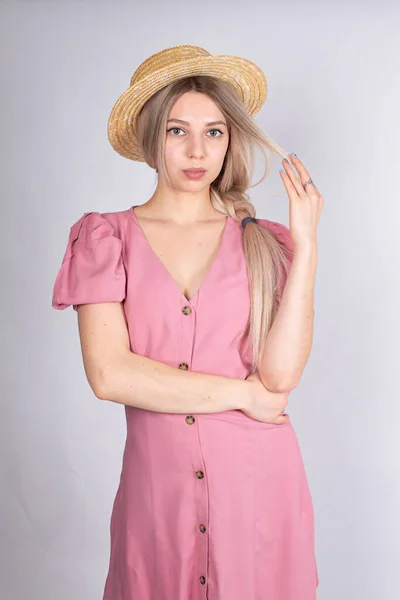 Woman Blonde Hair White Skin Isolated Grey Hat Pink Dress — стоковое фото