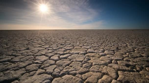 Timelapse Clouds Movement Sunshine Dry Cracked Earth Dramatic Scene — 비디오