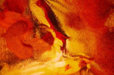 Soyut parlak kum arka planı. Akışkan sanat stilinde yaratıcılık için kırmızı ve sarı malzeme. Güzel renkli retro erimiş efekt. Yüksek kalite fotoğraf