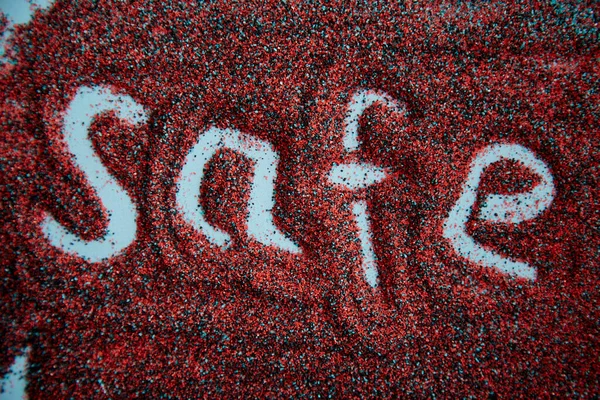 砂の表面に書かれた安全な手 カラフルな砂 創造的な販売の概念 トップ表示 — ストック写真