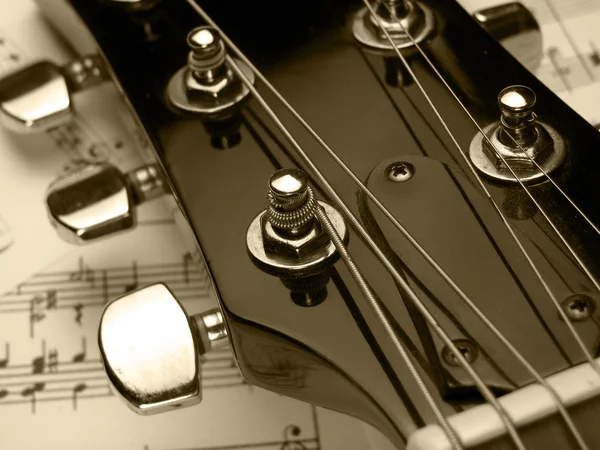 Nota e guitarra — Fotografia de Stock