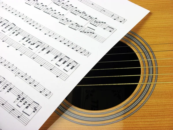 Uma nota e guitarra — Fotografia de Stock