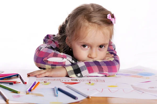 A tired child - an artist with a sketch Stock Image