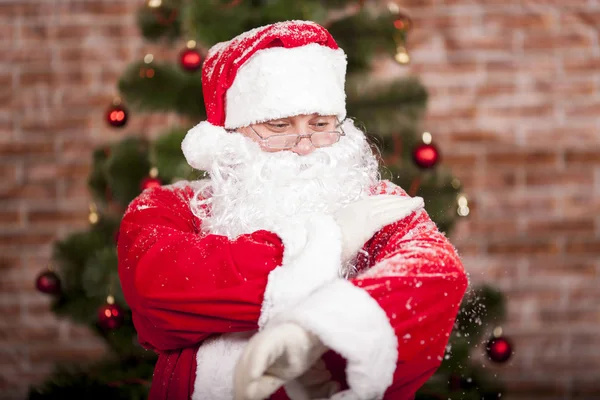 Santa Claus and snowfall — Stock Photo, Image