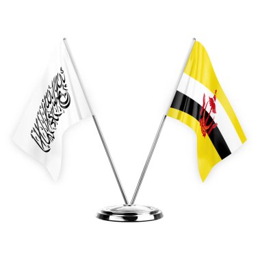 Beyaz arka planda izole edilmiş iki masa bayrakları. 3 boyutlu illüstrasyon, Afganistan ve Brunei.