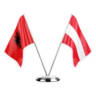 Two table flags isolated on white background 3d illustration, albenia and austria