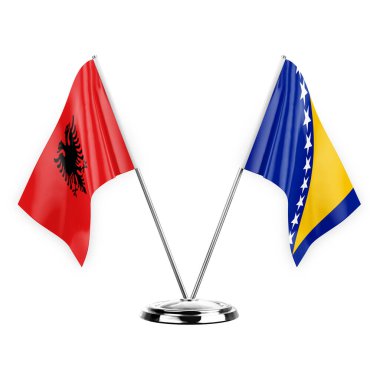 Two table flags isolated on white background 3d illustration, albenia and bosnia
