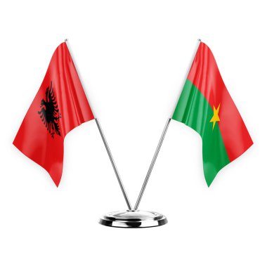 Two table flags isolated on white background 3d illustration, albenia and burkina faso