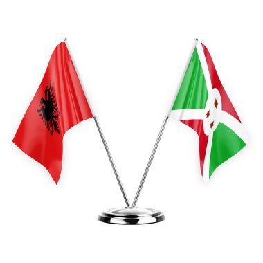 Two table flags isolated on white background 3d illustration, albenia and burundi