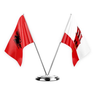Two table flags isolated on white background 3d illustration, albenia and gibraltar